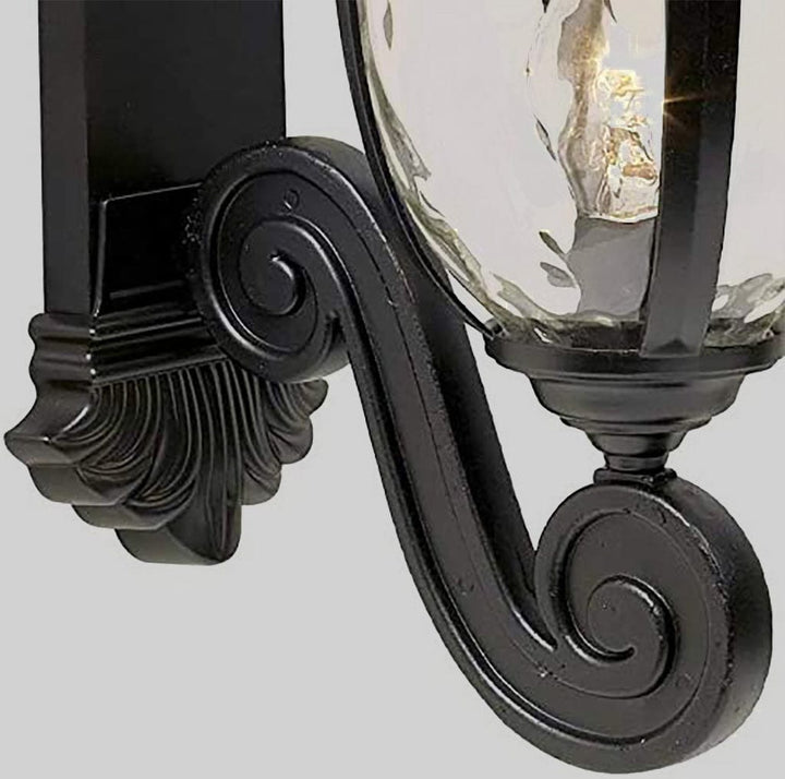 Rolling arm outdoor wall light