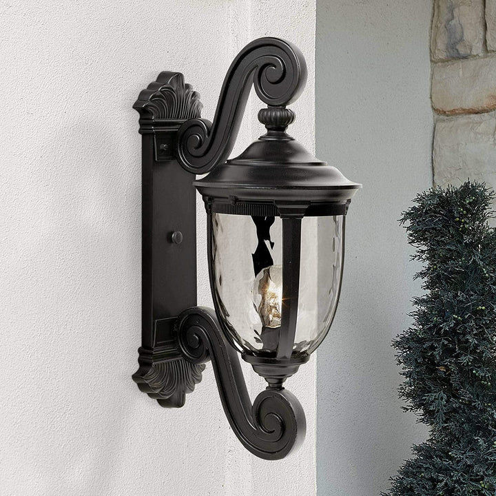 Rolling arm outdoor wall light